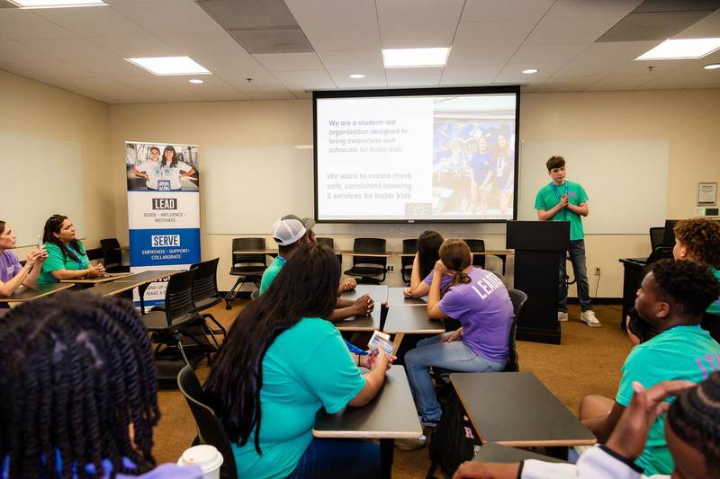 Students in an EBIT classroom during a talk.